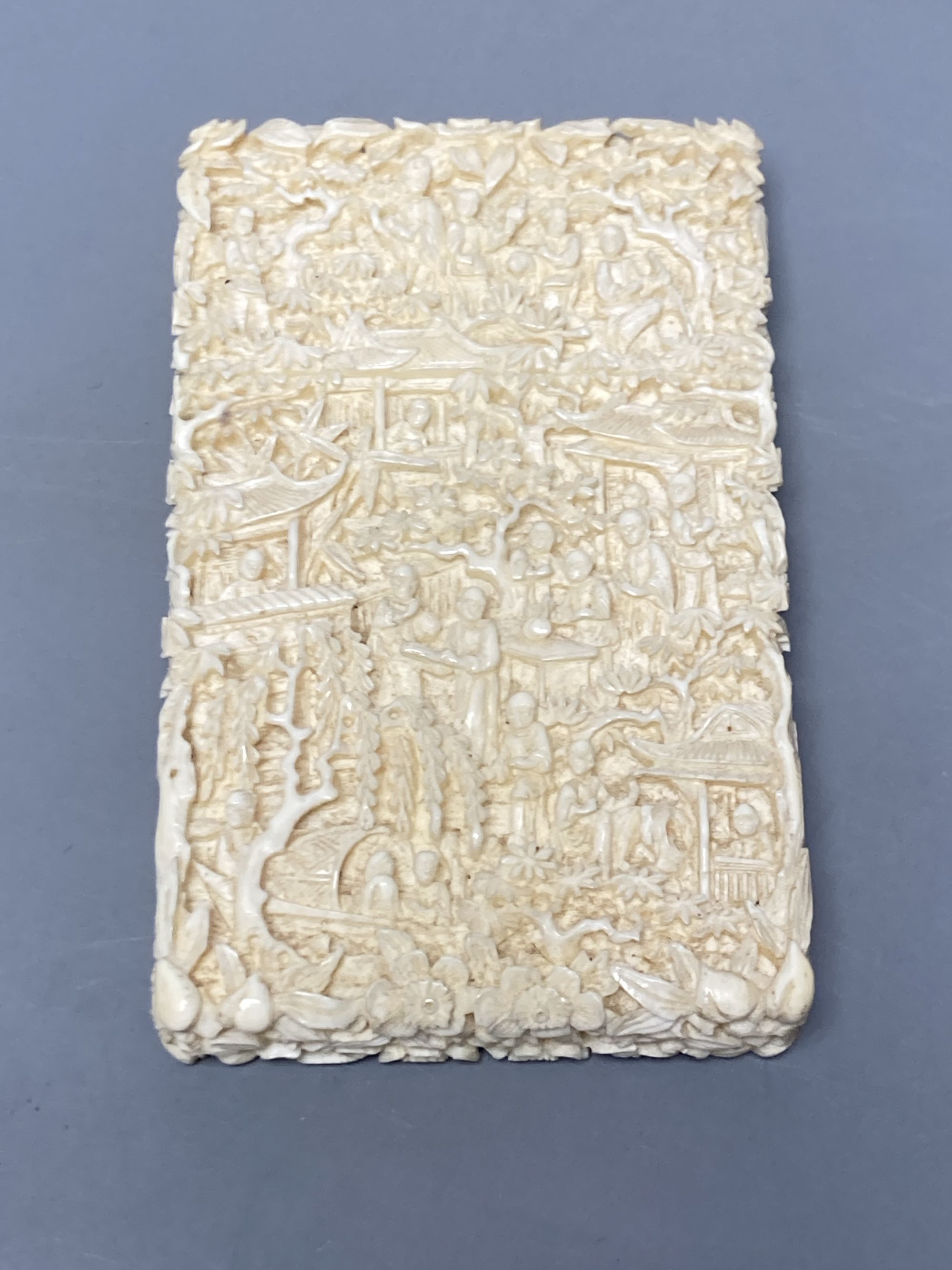 A 19th century Chinese export ivory case, in original brocade covered case stamped 'Luenchun', 11 x 7cm